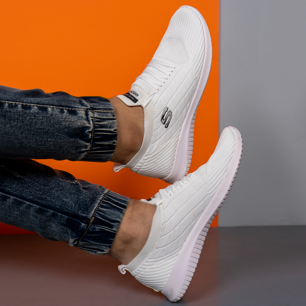 کفش ورزشی اسکیچرز مردانه سفید مدلE55