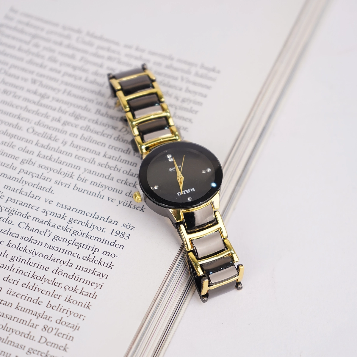 ساعت مشکی طلایی زنانه مدل Rado