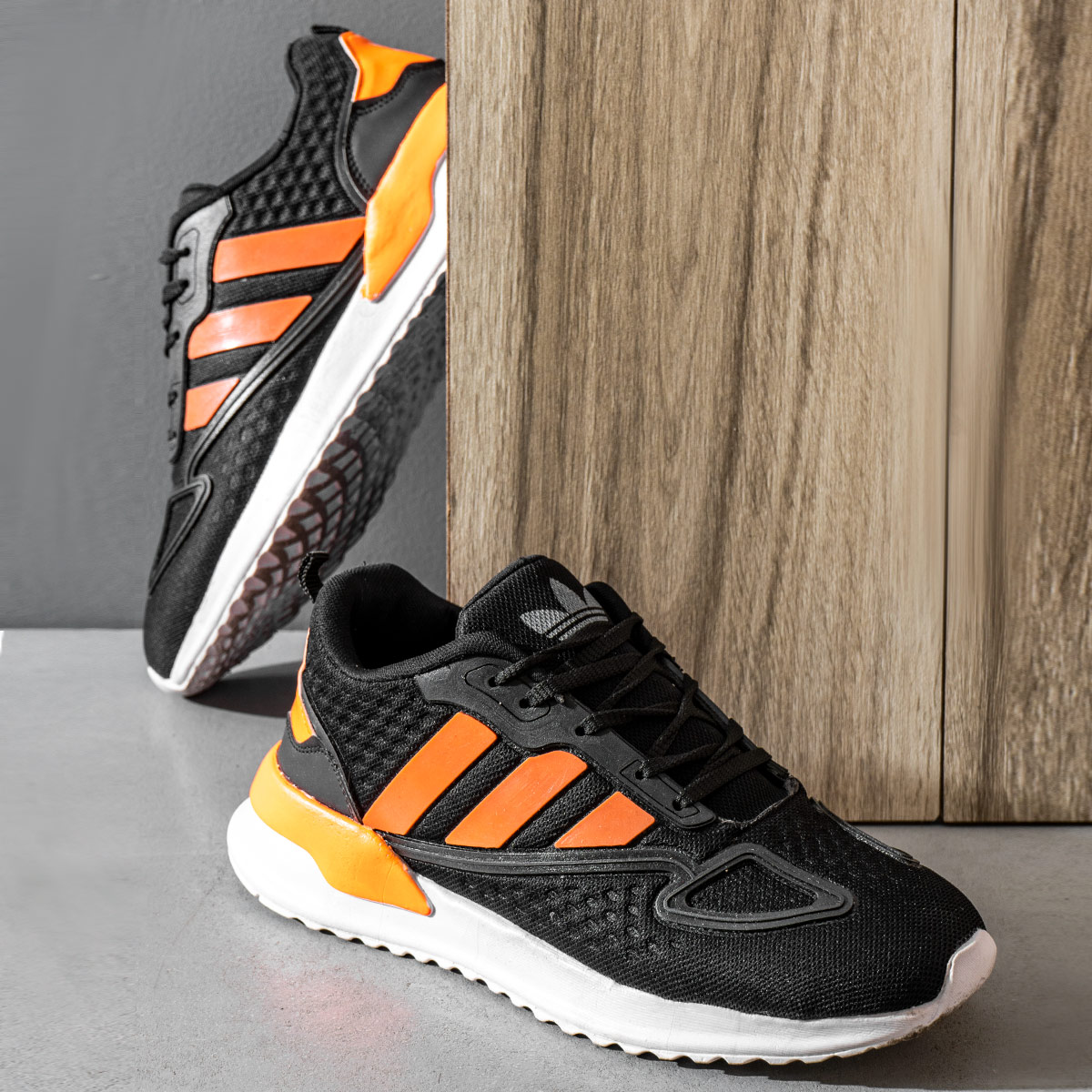 کفش ورزشی Adidas مردانه مشکی نارنجی مدل Siban