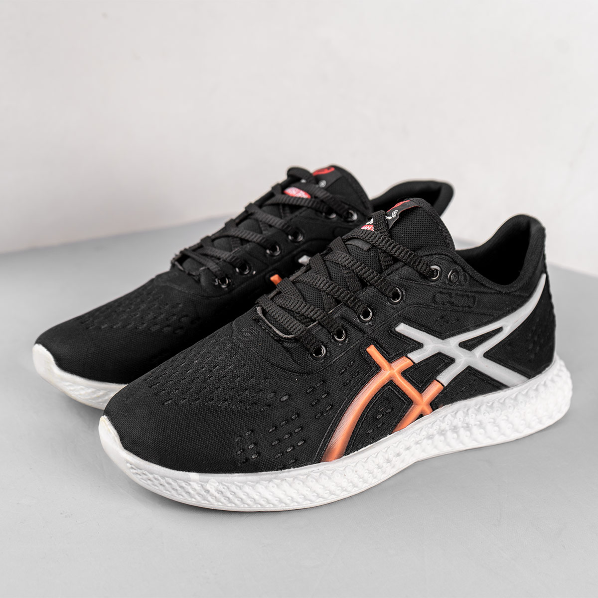 کفش ورزشی Asics مردانه مشکی نارنجی مدل Nardin(T)